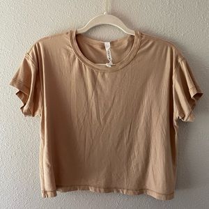 tan lululemon cropped shirt